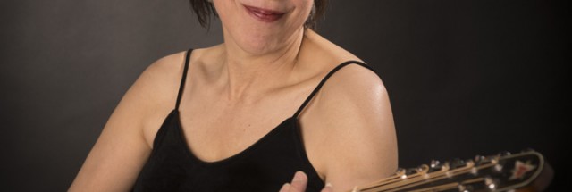 Carol Coronis playing the cittern publicity shot